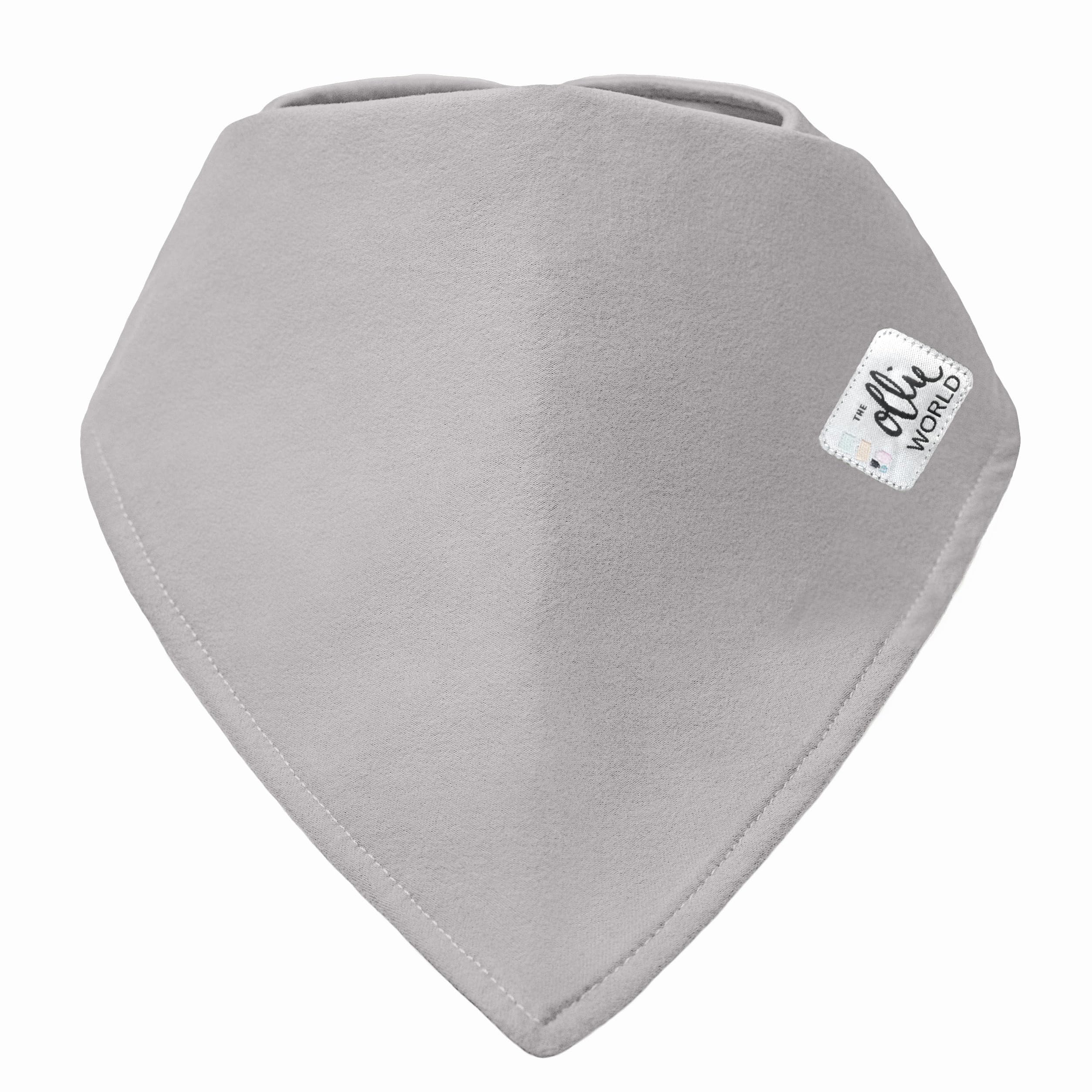 Stone fabric close-up of The Ollie Baby Bib showing soft material