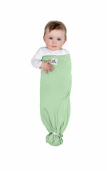 The Ollie Swaddle arms-out setup ready for diaper change.
