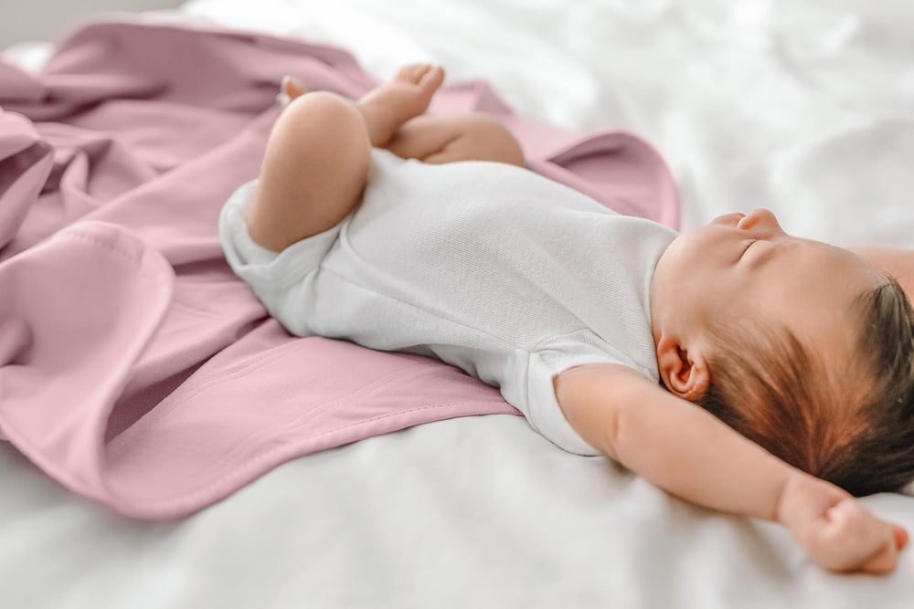 The Ollie Swaddle delicate-bag-included protects fabric during washing