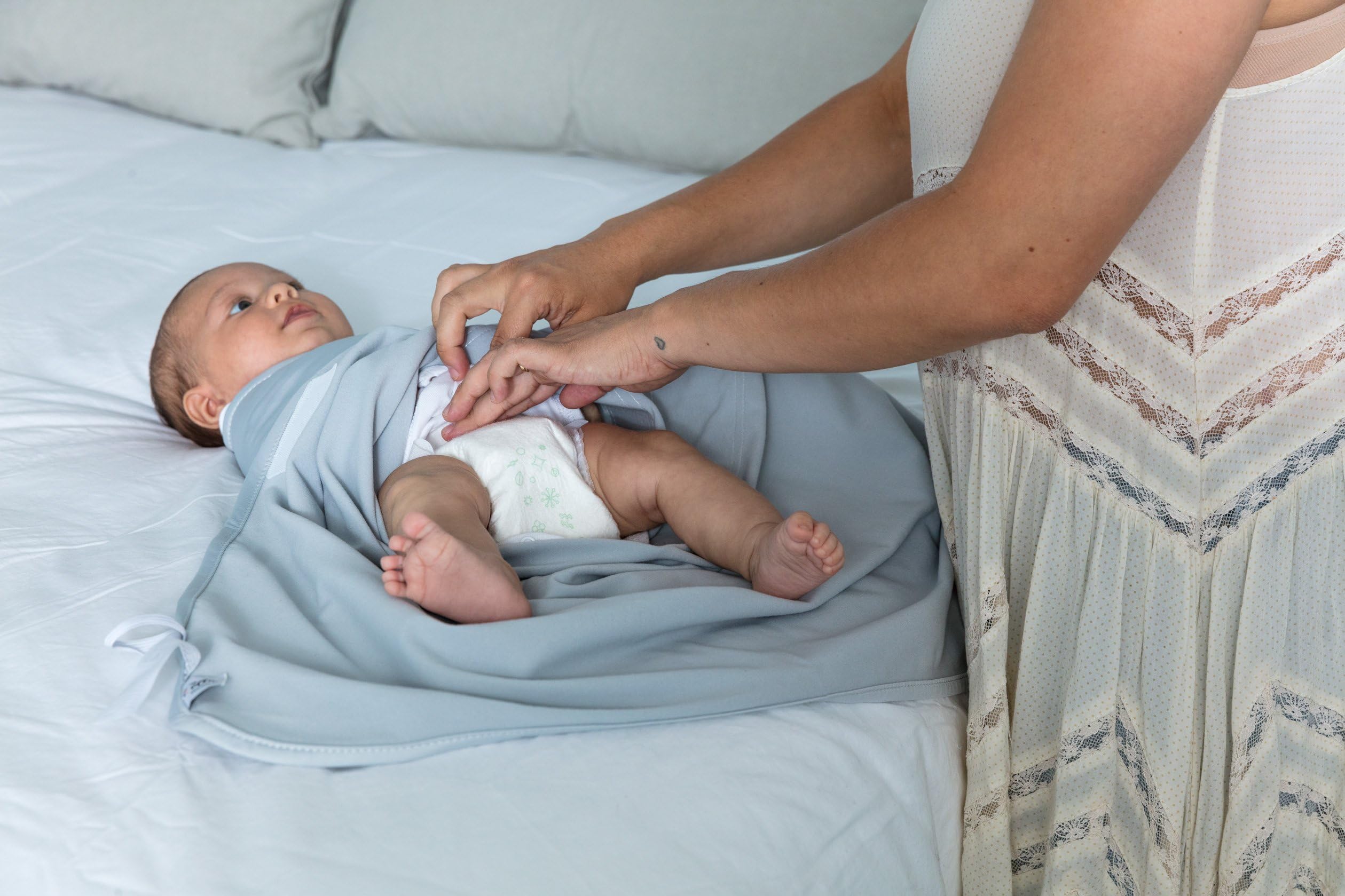 The Ollie Swaddle machine-washable construction simplifies laundry routines.