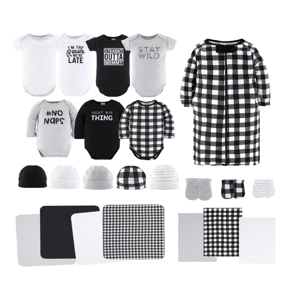The Peanutshell baby layette gift set layout shows 23 pieces for newborn girls.