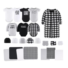 The Peanutshell baby layette gift set layout shows 23 pieces for newborn girls.