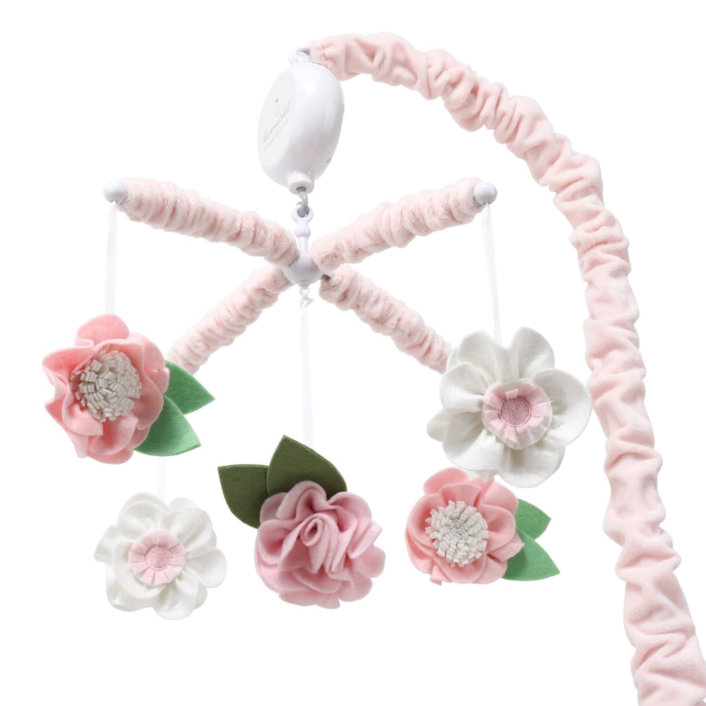 The Peanutshell rotating-rotation mobile provides gentle motion for sleep routines.