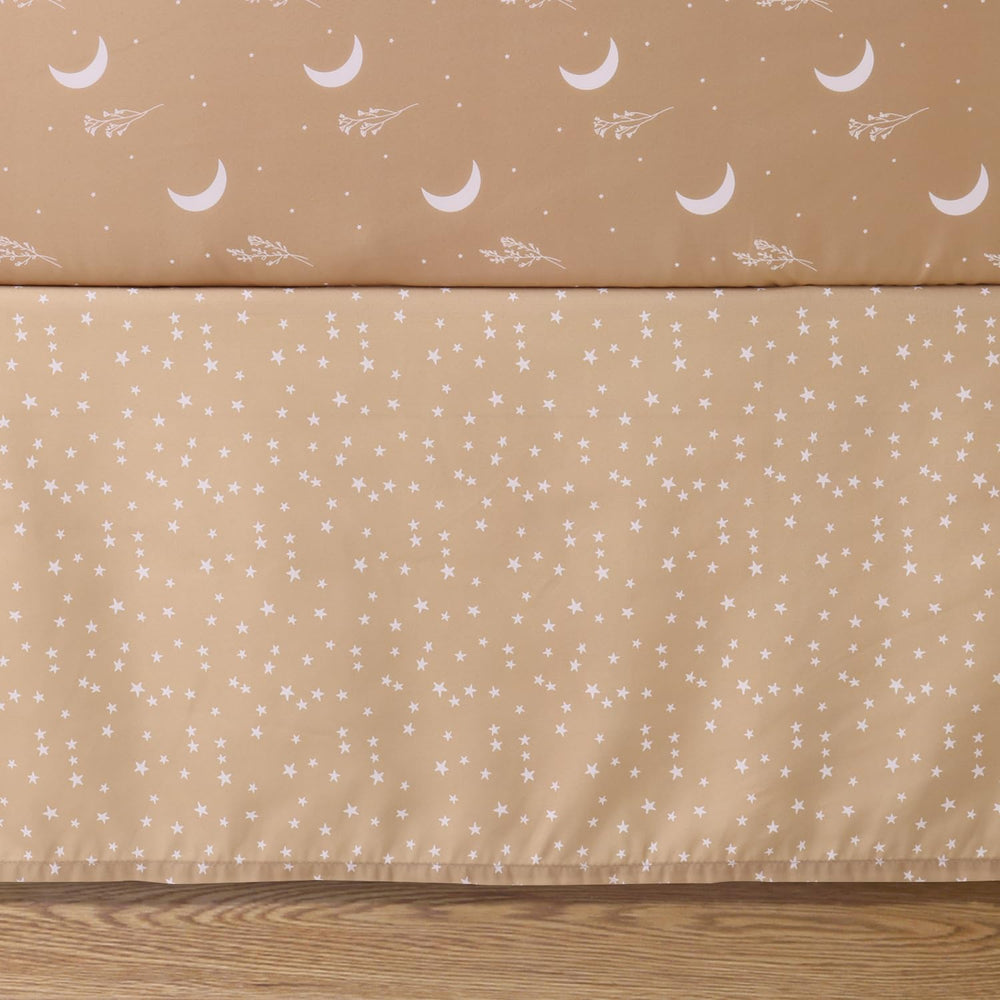 The Peanutshell celestial patchwork detail adds playful texture to the nursery decor.