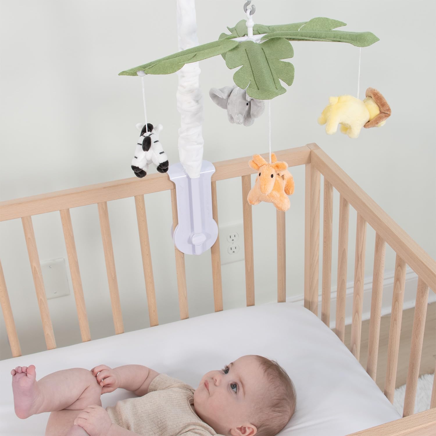 The Peanutshell crib mobile detachable arm for easy storage.