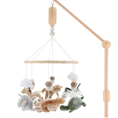 The Peanutshell crib mobile with elephant features soothing lullabies and soft rotation.