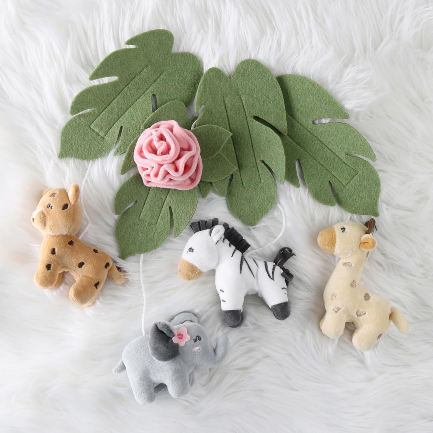 The Peanutshell crib mobile as nursery decor that brightens and personalizes the room