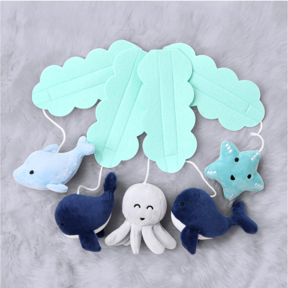 The Peanutshell nautical-themed crib mobile adds playful decor to any crib.