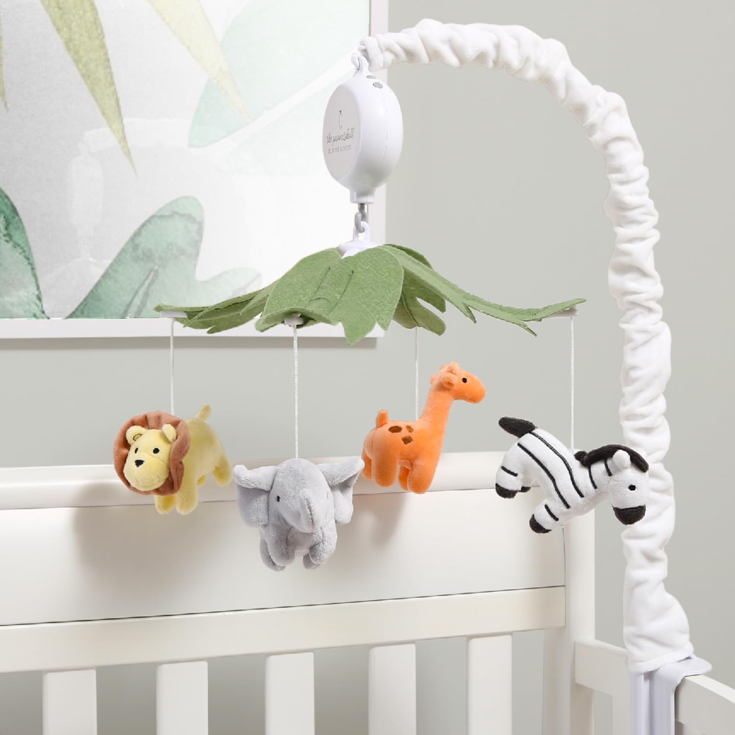 The Peanutshell crib mobile doubles as cheerful nursery decor.