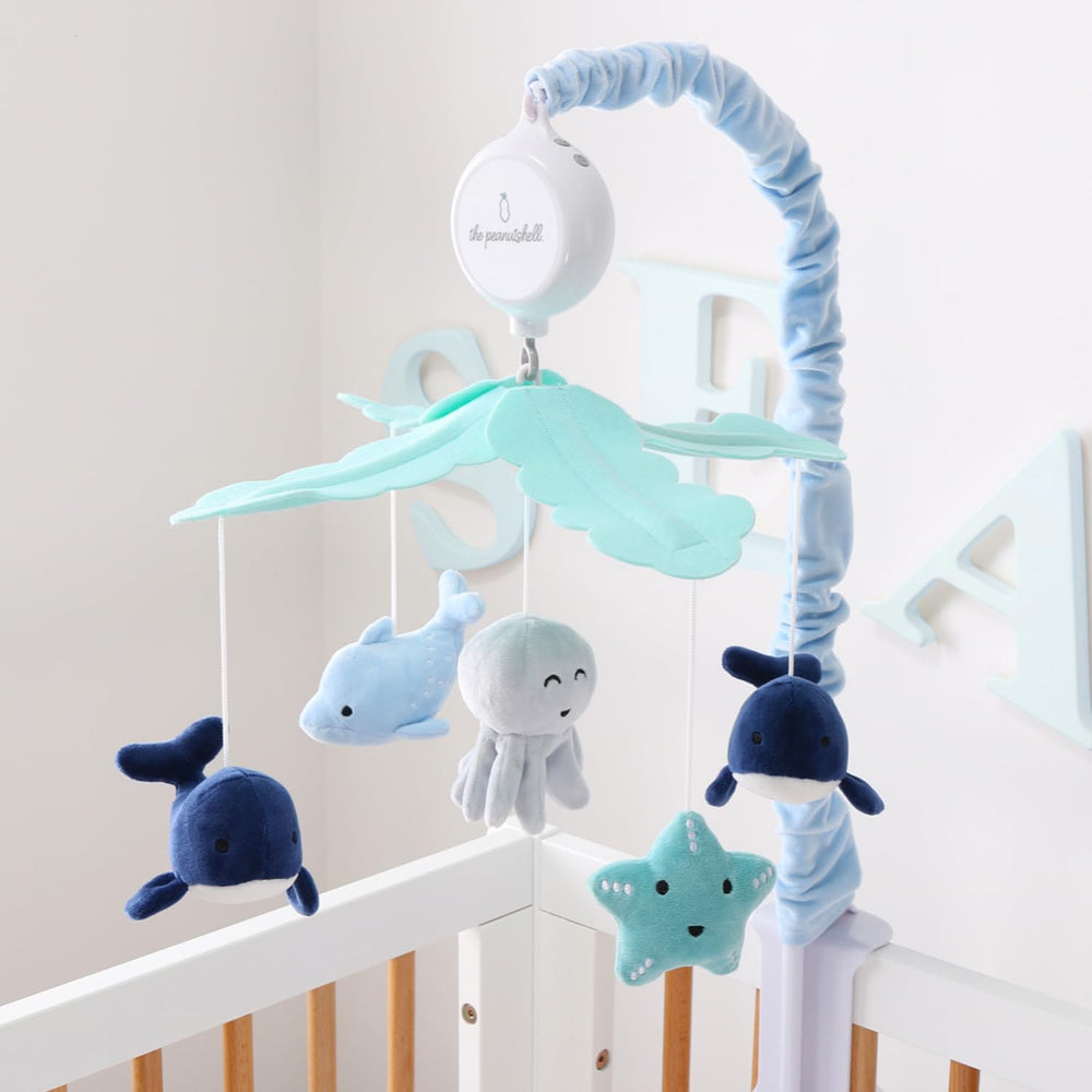 The Peanutshell crib mobile with three settings offers music, rotation, or both.