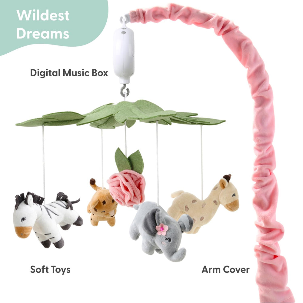 The Peanutshell crib mobile with wildest dreams motif and plush safari animals above the crib