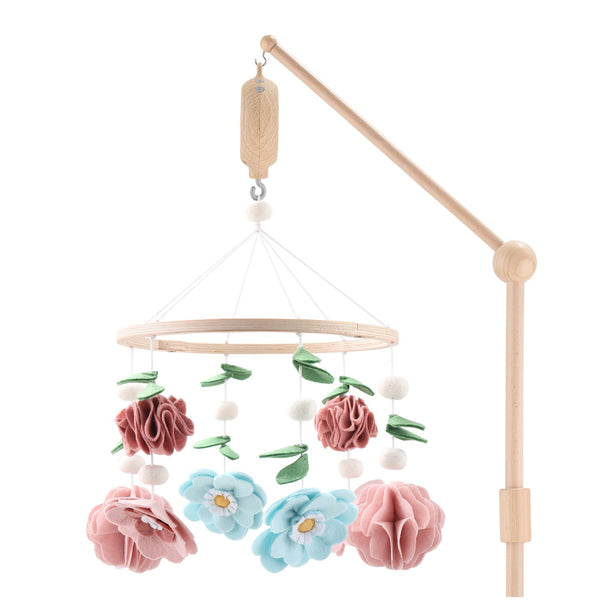 The Peanutshell crib mobile with wildflower flowers offers gentle rotation for soothing visuals.