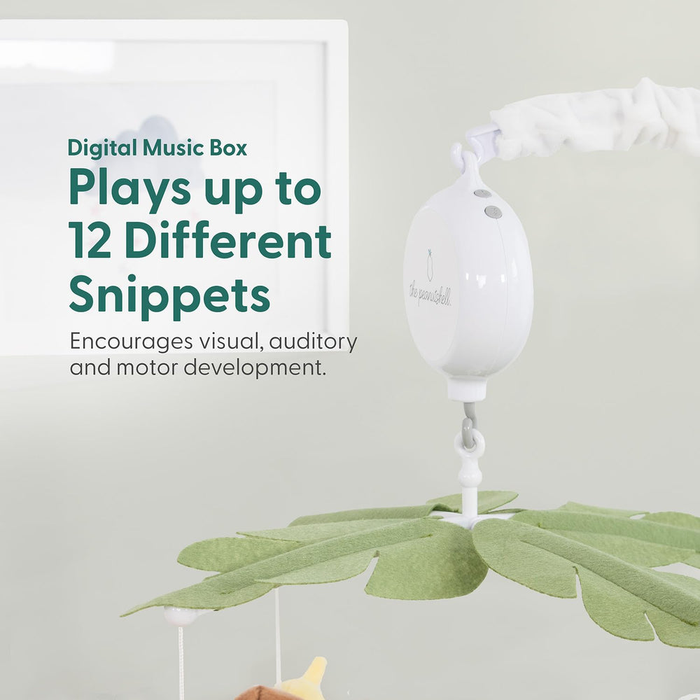 The Peanutshell crib mobile zebra enhances safari themed nursery decor.