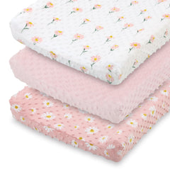 The Peanutshell daisy floral changing pad cover 3-pack for coordinated nursery decor.