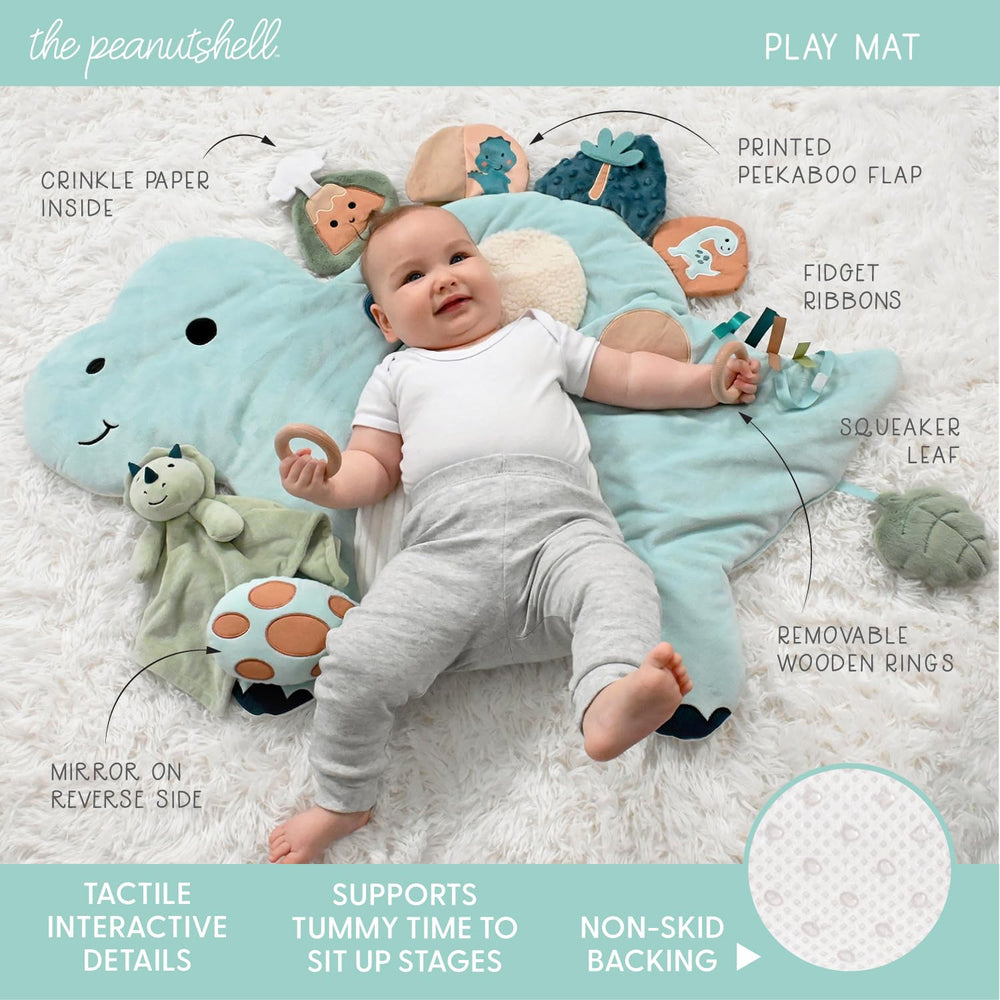 The Peanutshell dinosaur nursery decor coordinates with mobiles and clothes for a cohesive theme