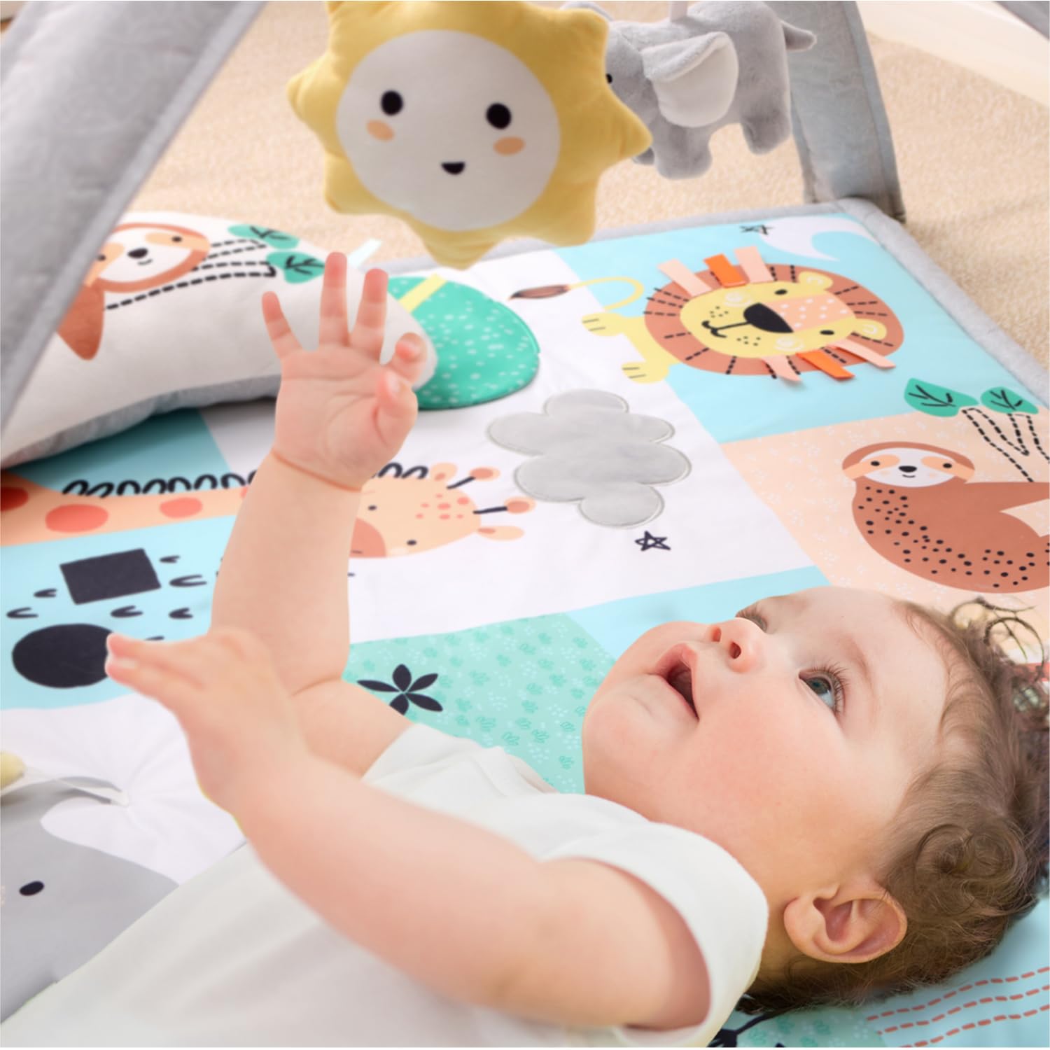 The Peanutshell easy-assembly play gym folds flat for quick setup.