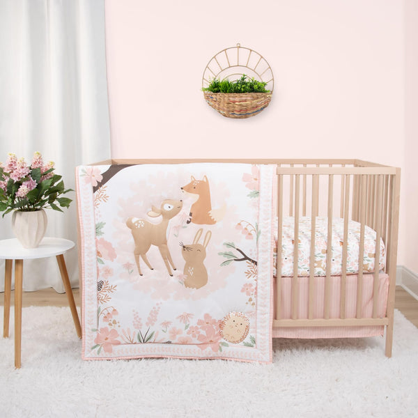 The Peanutshell Fairytale Forest crib quilt adds cozy whimsy for peaceful naps.