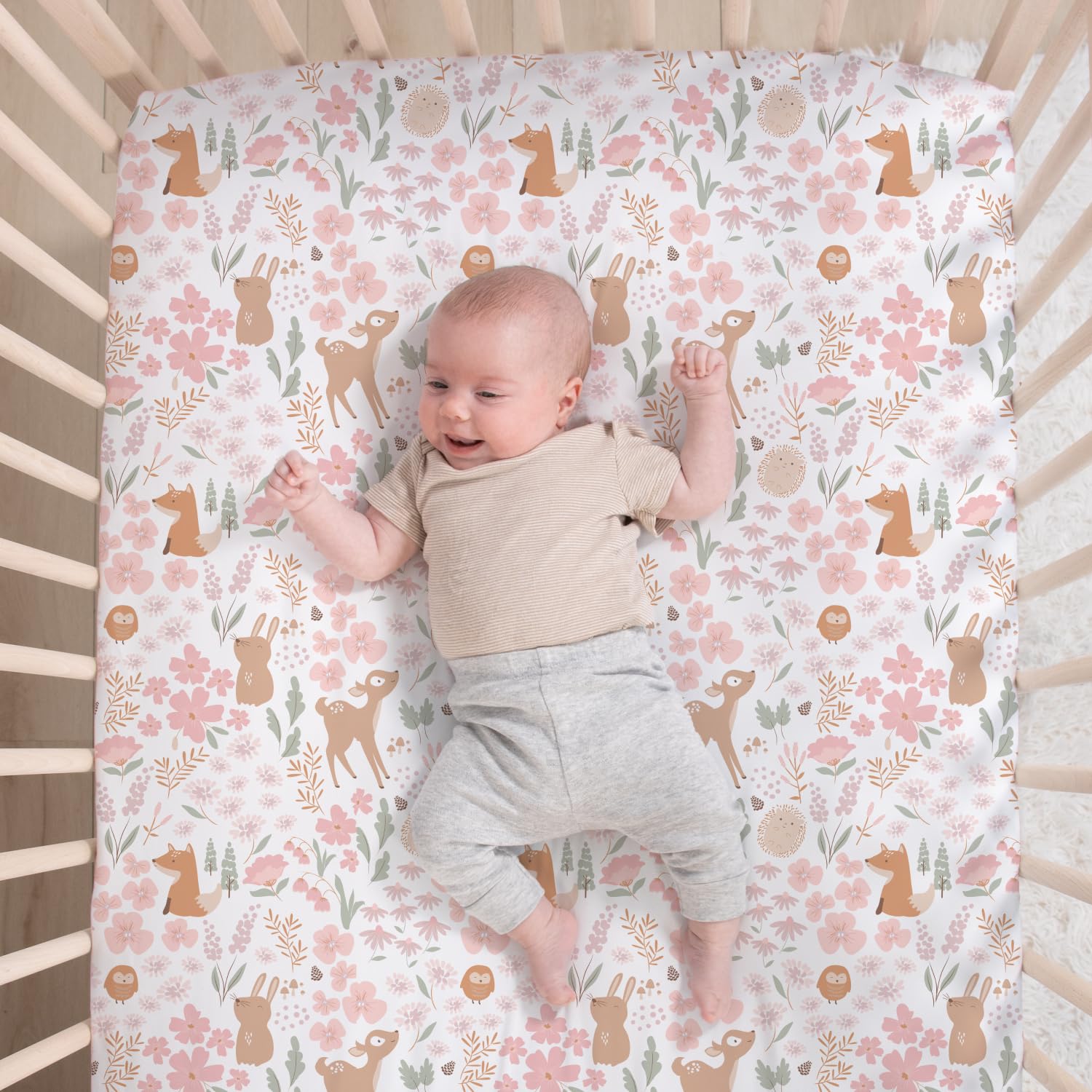 The Peanutshell Fairytale Forest dust ruffle finishes the nursery look.
