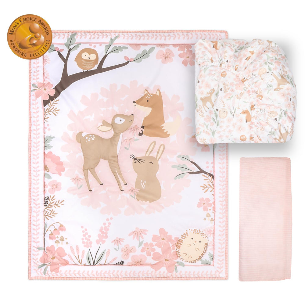 The Peanutshell Fairytale Forest fitted sheet delivers snug, secure crib sleep.