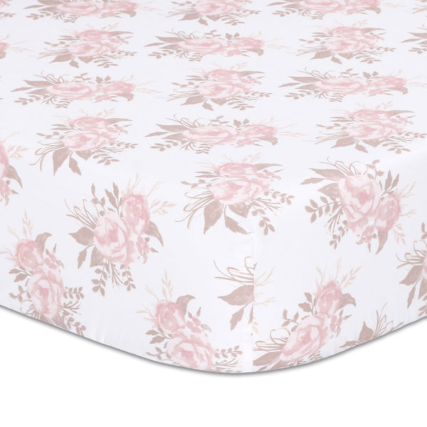 The Peanutshell Grace crib sheet with pink floral print offers a soft, comfortable sleep surface