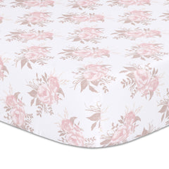 The Peanutshell Grace crib sheet with pink floral print offers a soft, comfortable sleep surface
