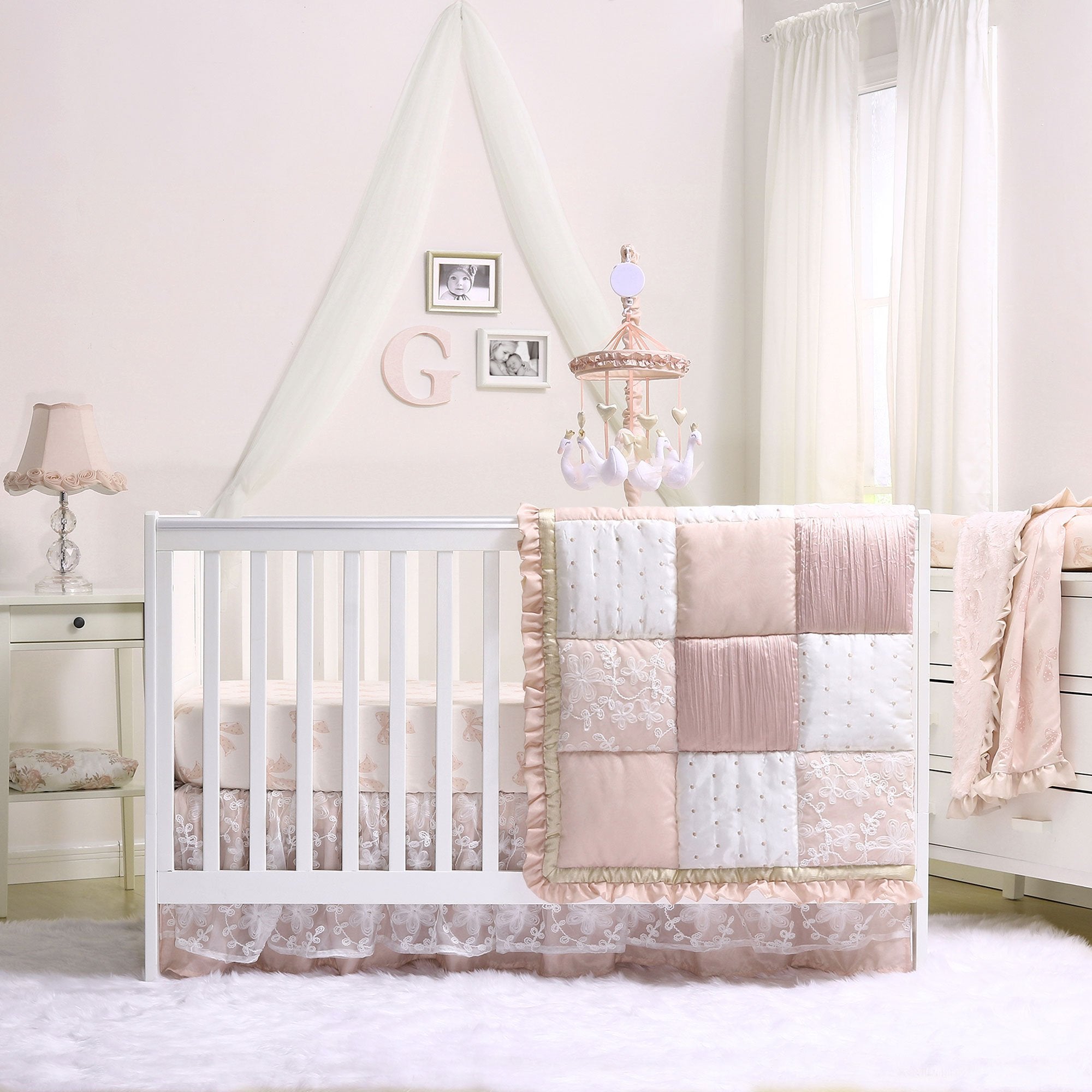 The Peanutshell Grace crib sheet with rosebud pattern is durable and easy to care for
