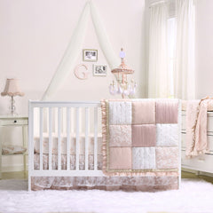 The Peanutshell Grace crib sheet with rosebud pattern is durable and easy to care for