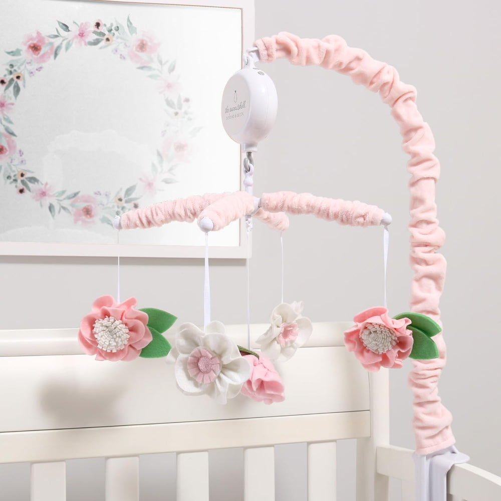 The Peanutshell pink-rose mobile includes volume control for comfortable sound.
