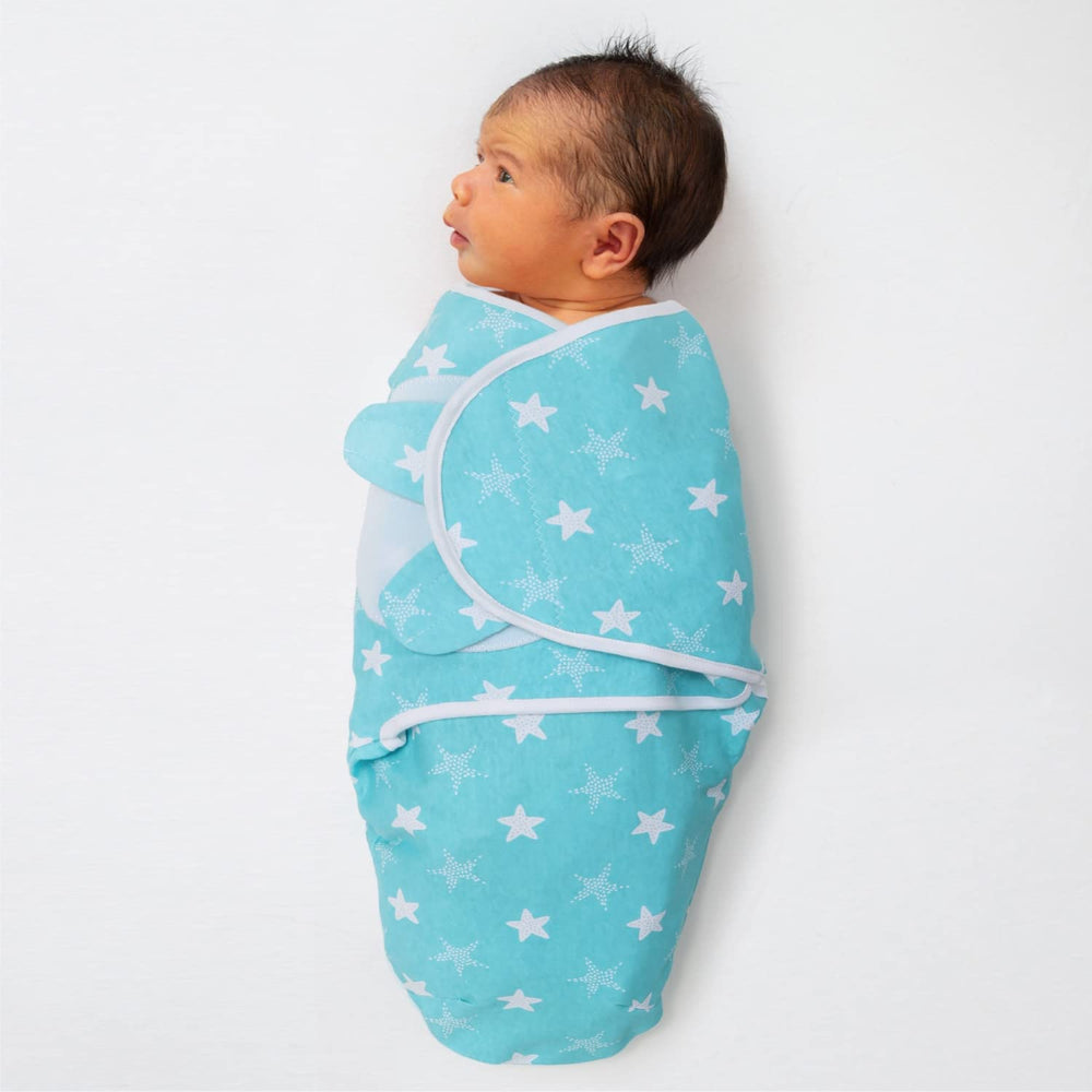 The Peanutshell Twinkle Twinkle swaddle showing adjustable wings for a snug fit.