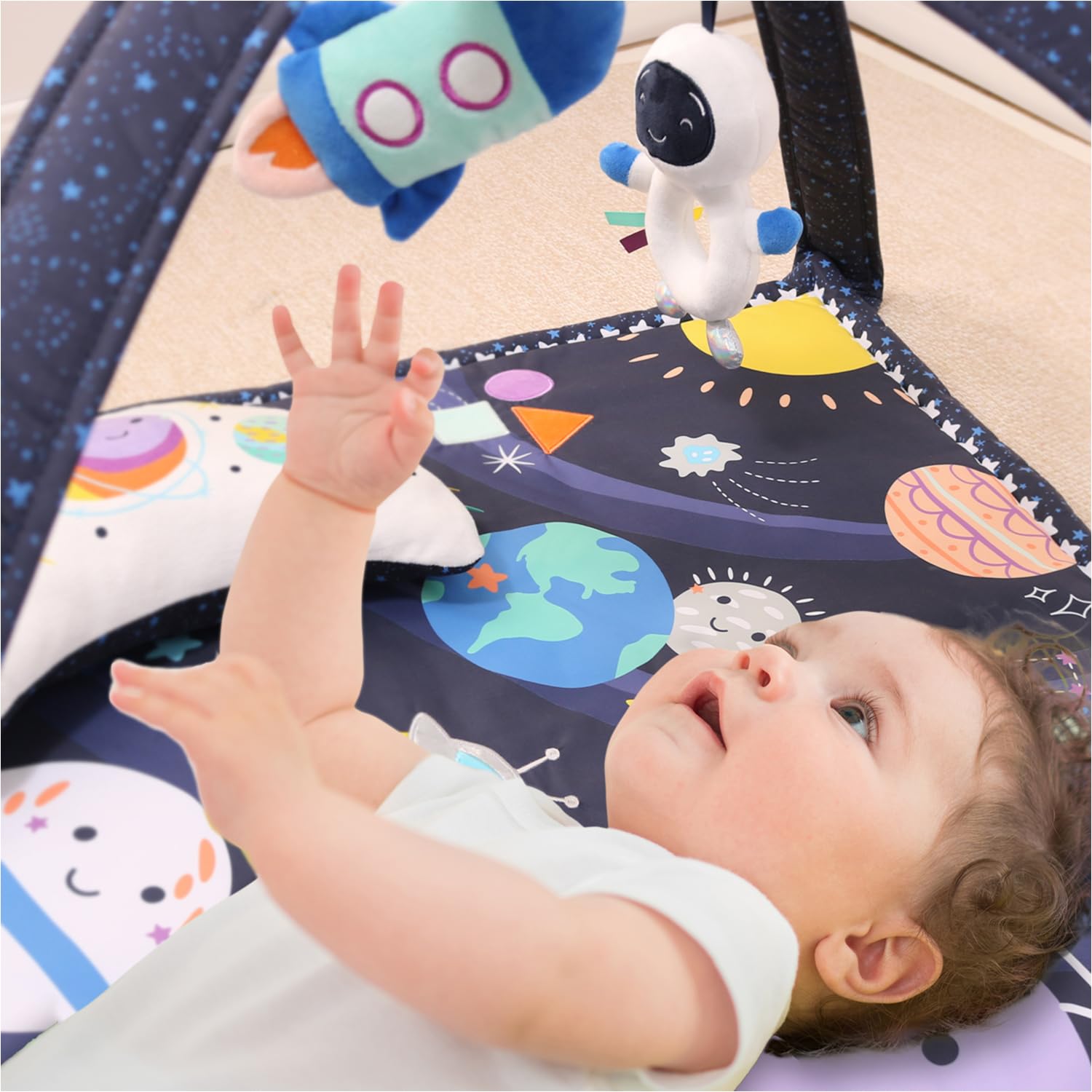 The Peanutshell Travel-Ready Baby Gym provides a familiar play space on the go.