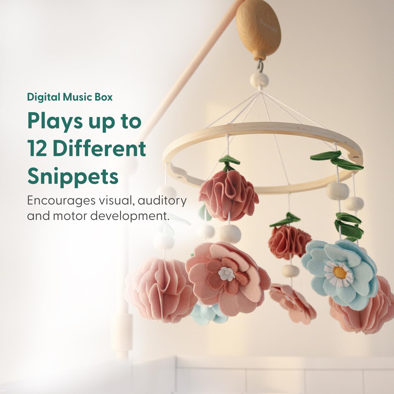 The Peanutshell wooden crib mobile features durable design with calming melodies.