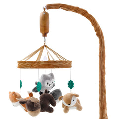 The Peanutshell woodgrain crib mobile with woodland animals soothing baby to sleep