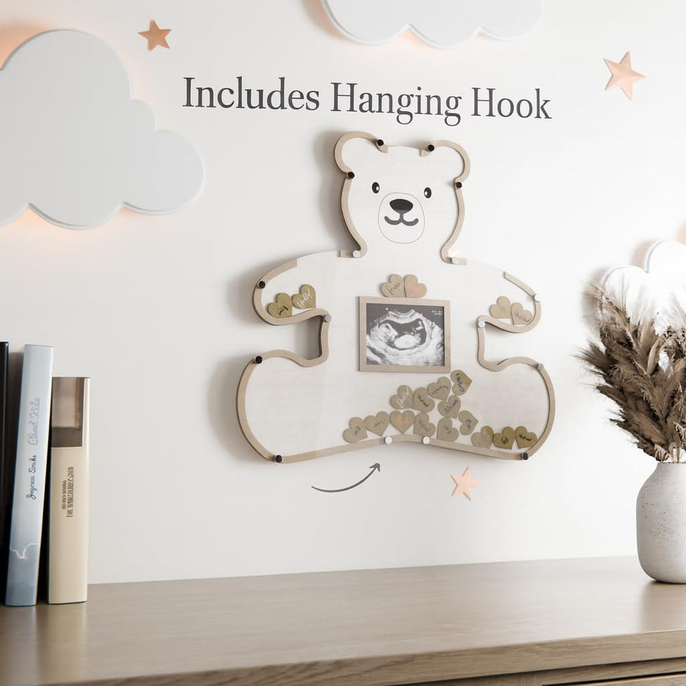 The Real Bossy Baby signature hearts capture guest well wishes.