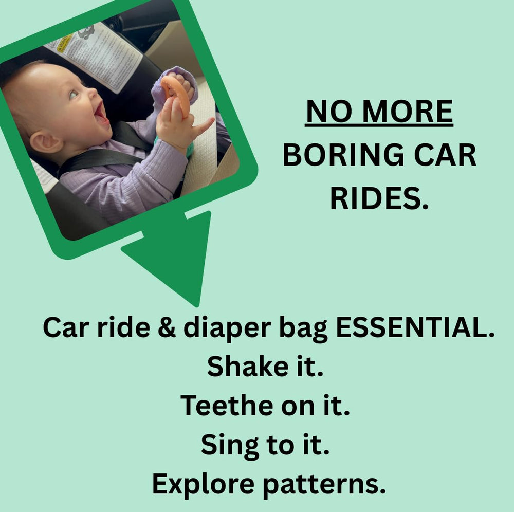 The Singing Mom microphone teether compact travel-friendly design beside a diaper bag