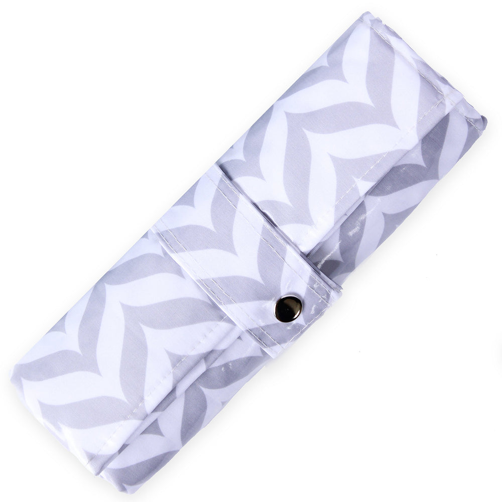 The Snug Bug changing pad laid-out 18in x 25in for comfortable diaper changes.