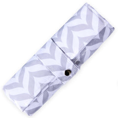 The Snug Bug changing pad laid-out 18in x 25in for comfortable diaper changes.