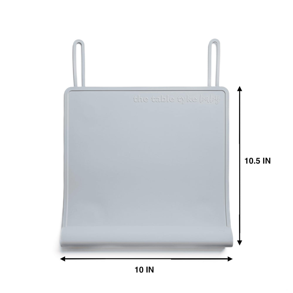 One premium placemat that adapts from baby to toddler use at home or away.