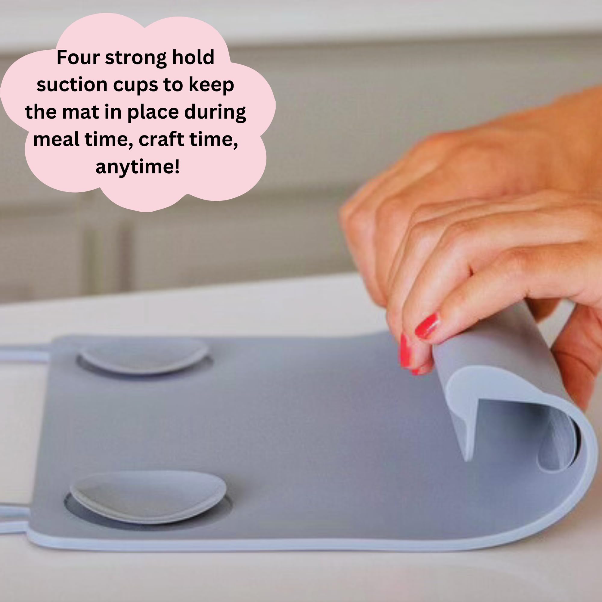 The Table Tyke raised edge spill barrier containing crumbs and liquids