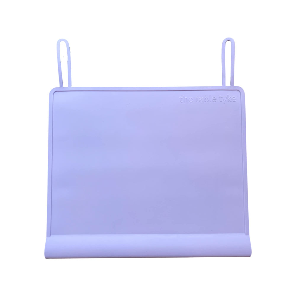 The Table Tyke edge bumper placemat protects tiny mouths at meals.