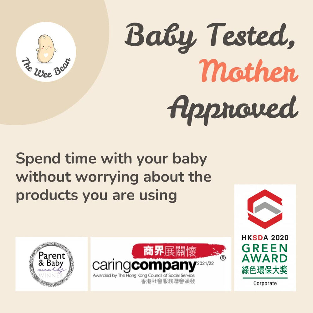 The Wee Bean bib supports teething days with drool management.