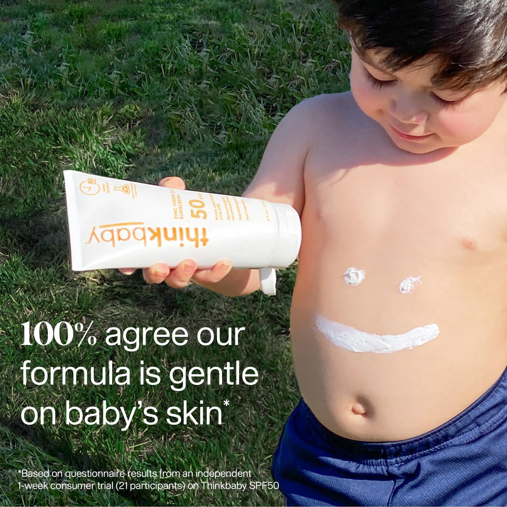 Thinkbaby SPF 50+ being spread on baby's skin with quick absorption.
