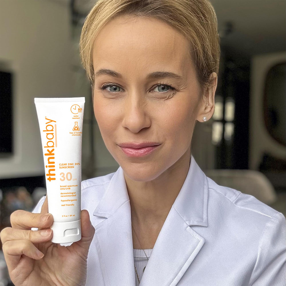 Thinkbaby water-resistant sunscreen protecting skin while swimming.