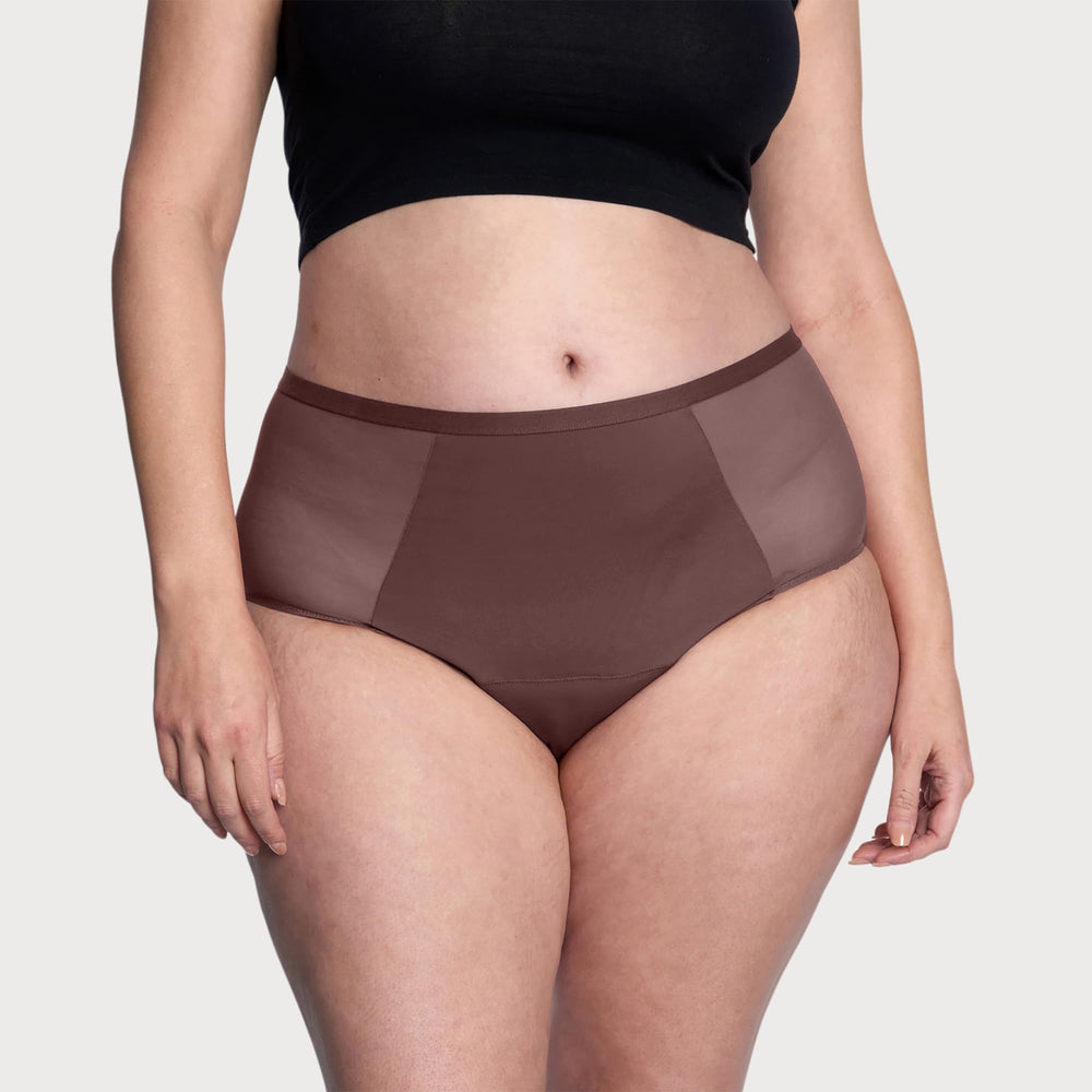 THINX Comfort Stretch waist model wearing underwear for all-day confidence and leak protection
