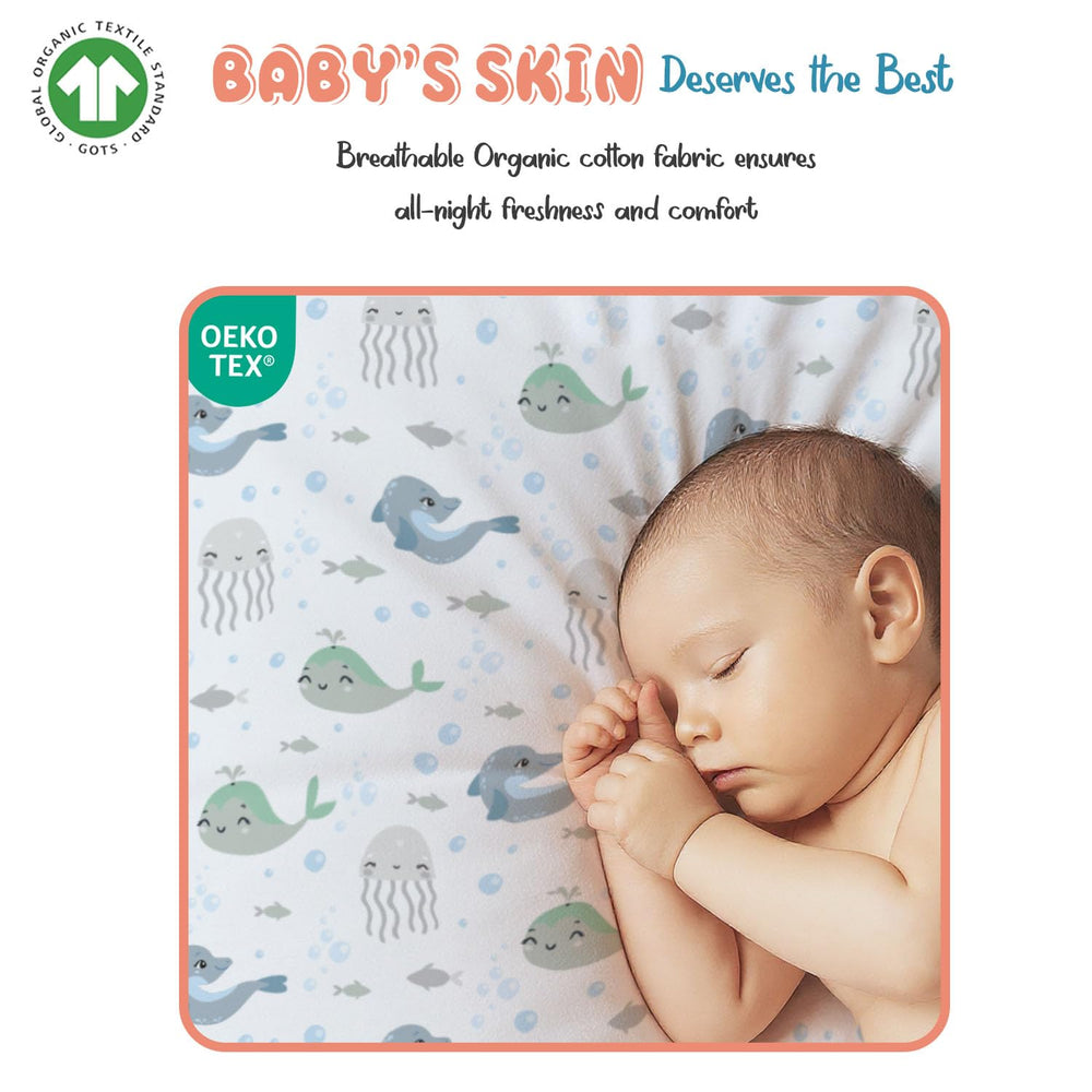 Threadmill gender-neutral crib sheet blends with nursery decor