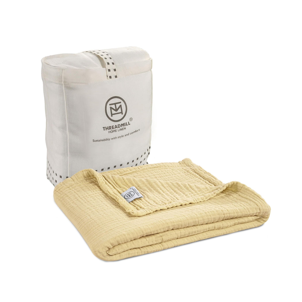 Threadmill Muslin Blanket 4-layer swaddle gently cradles newborns while staying breathable.