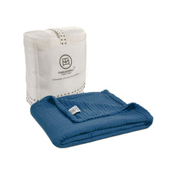 Threadmill Muslin Blanket close-up shows ultra-soft fabric for baby's comfort.