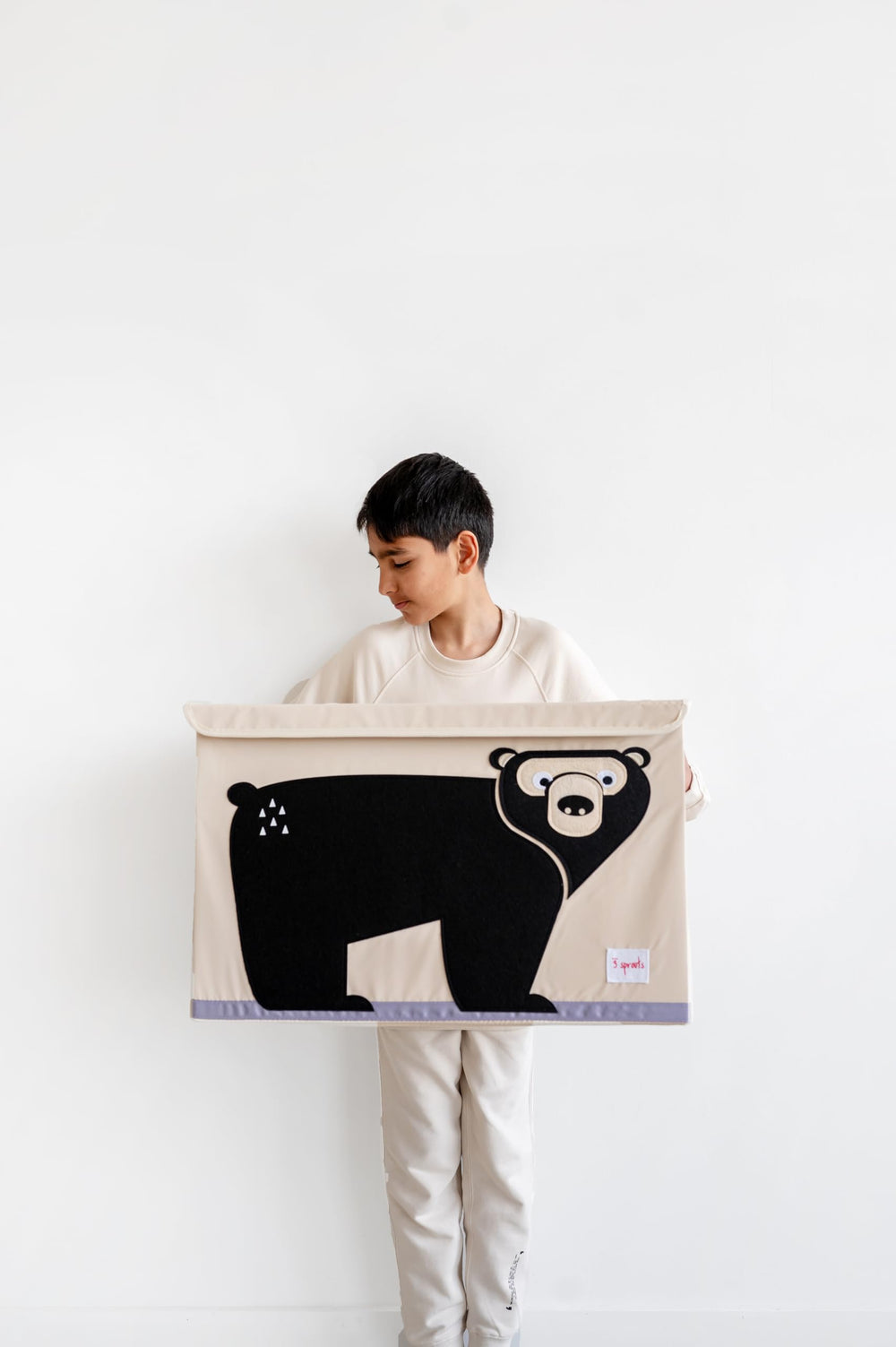 Three Sprouts collapsible toy chest folded for compact storage.