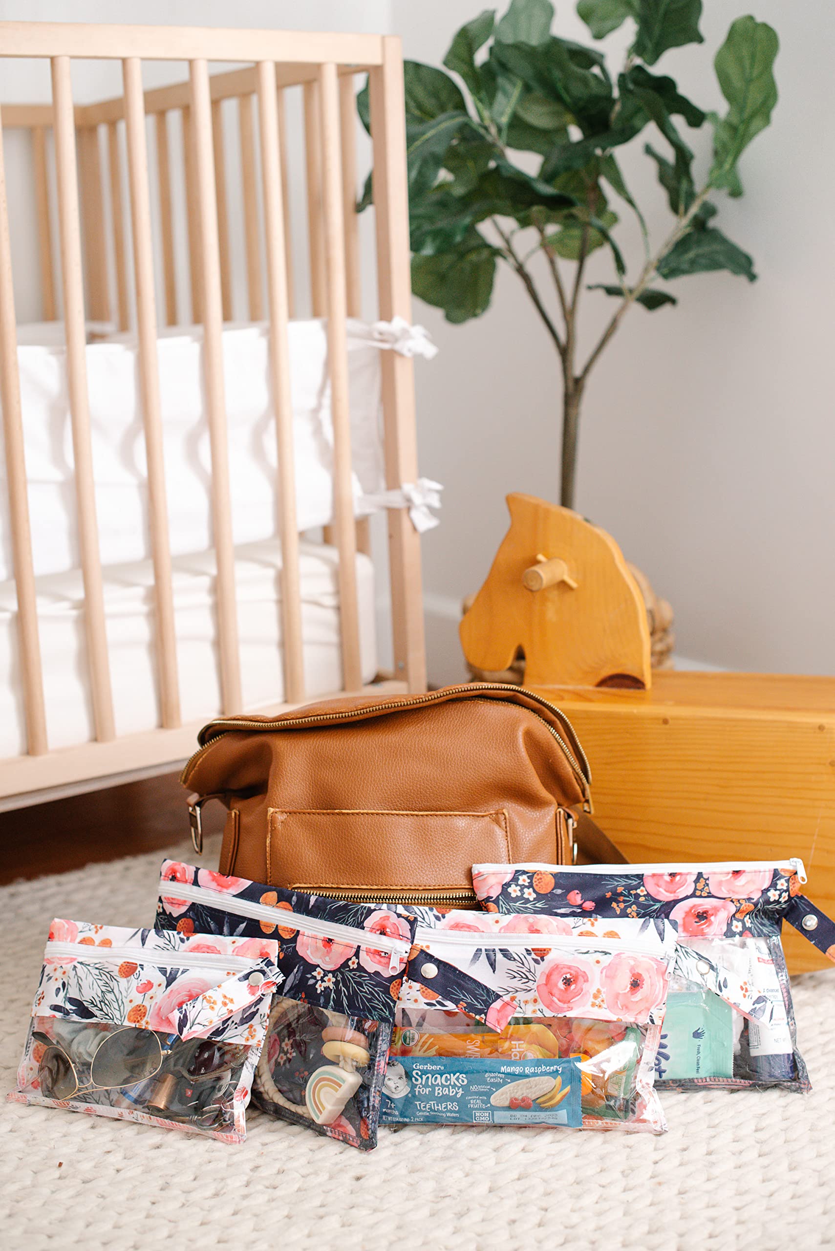 Three Sweet Peas Co clear diaper bag pouch medium one with toys neatly organized