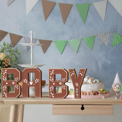 Threehoney Cielito Lindo baby shower decor letters on a shelf