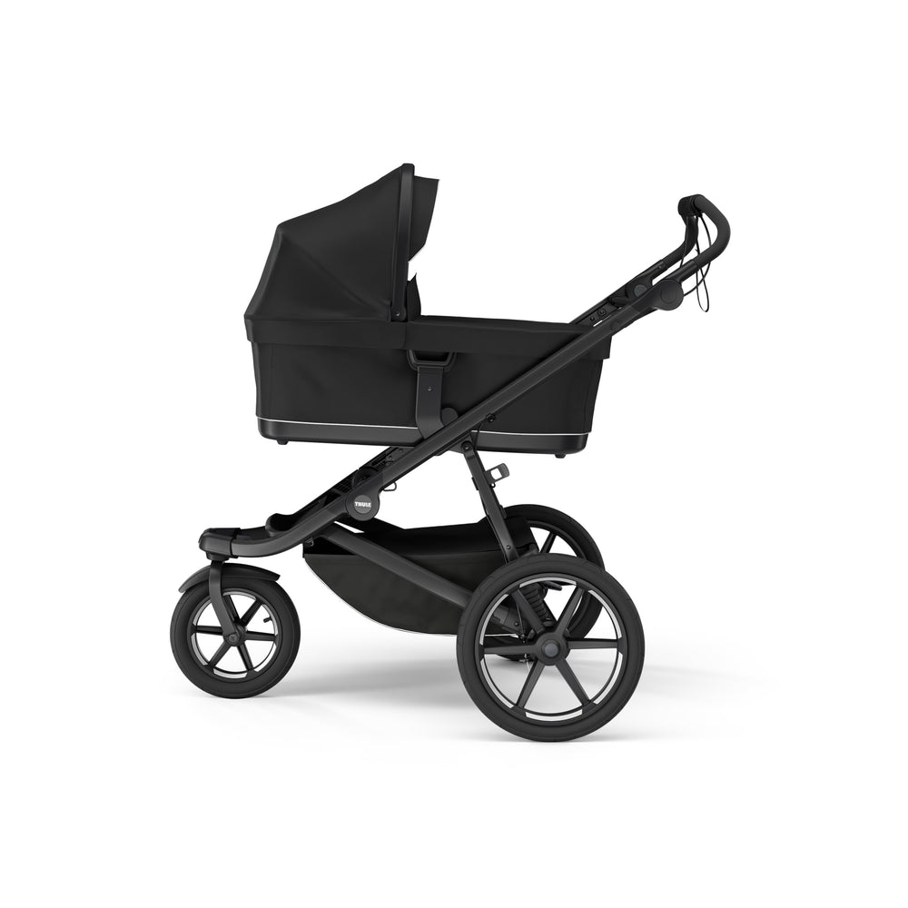 Click-in adapters for quick, secure Thule bassinet attachment